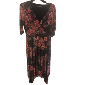 15.  Suzy Shier Black Floral Asymmetrical V neck Dress size Medium.